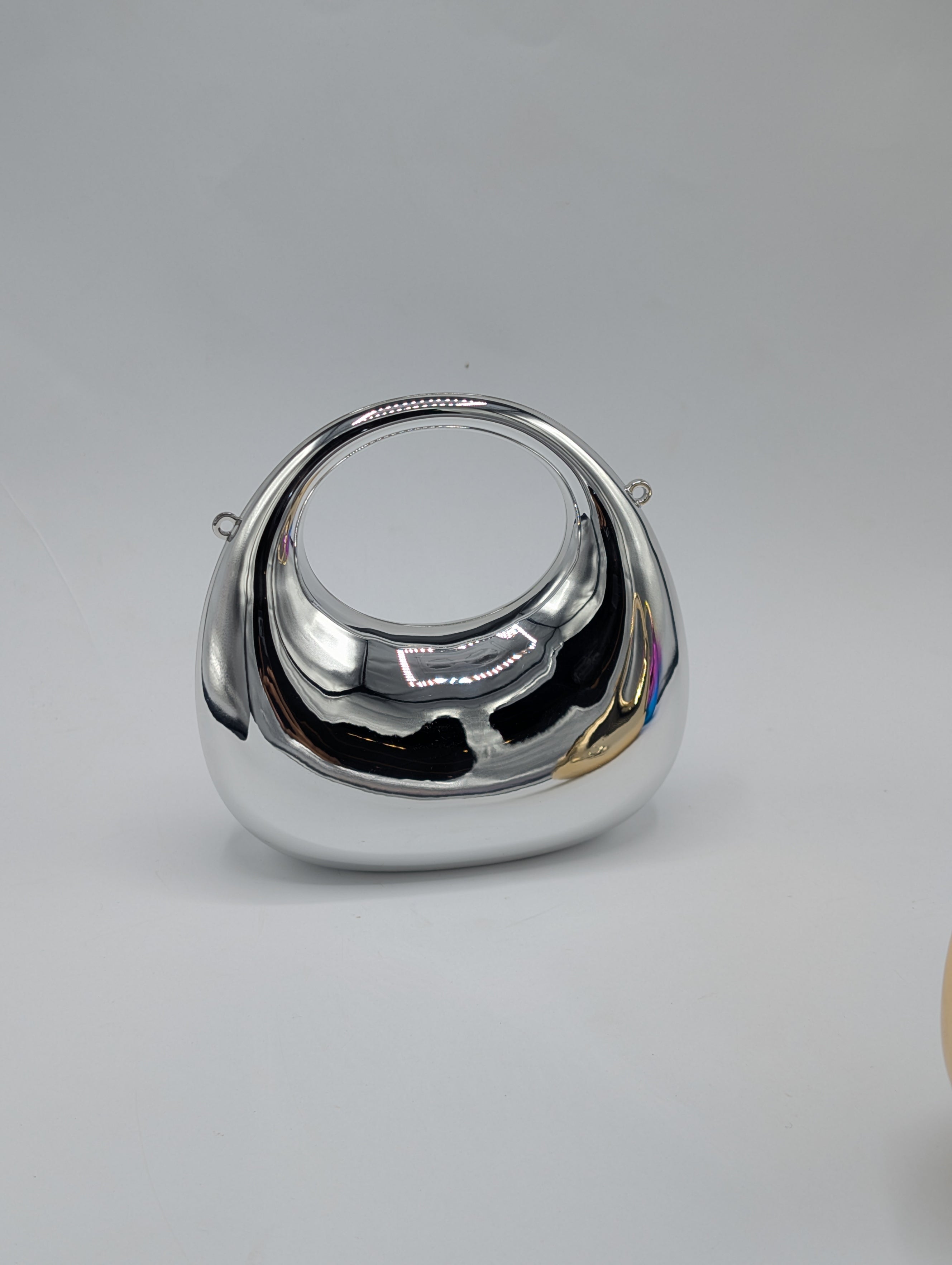 Shape: Rounded crescent