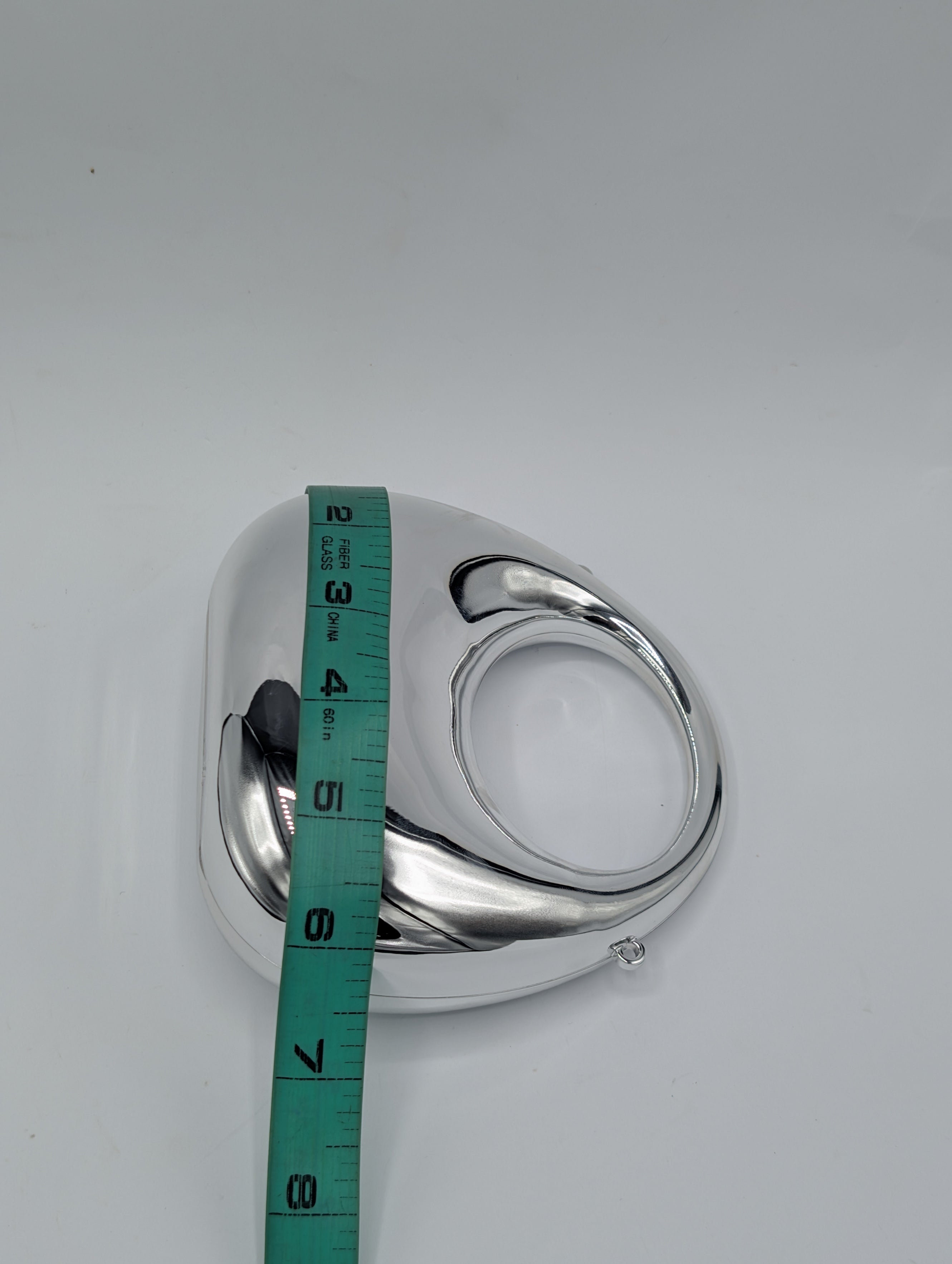 Shape: Rounded crescent